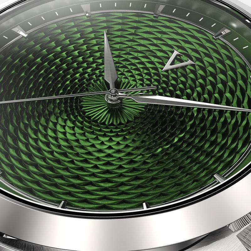 Macro of the VALUSIS Velturion Green dial showing the guilloché wave pattern